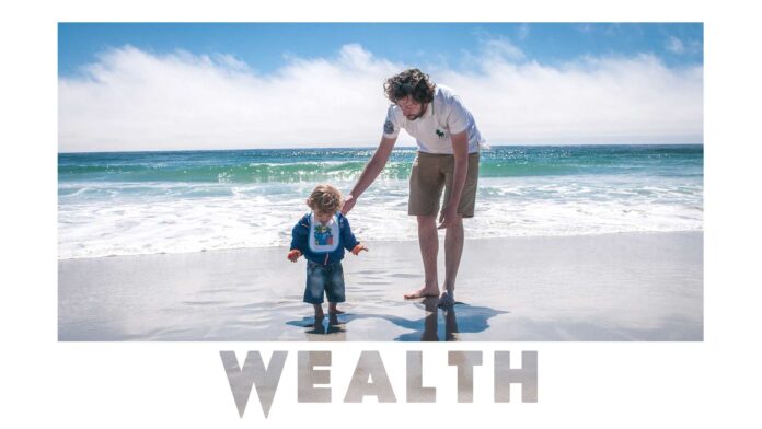 wealth-rich-motivational-quote-dad-plays-with-son-beach-inspirational-picture