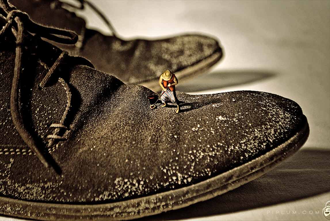 Man-cleaning-shoes-Surreal-photography
