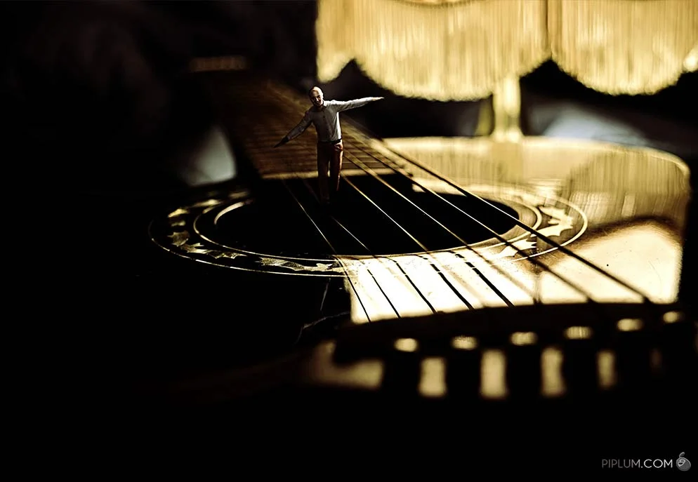 Life is all about balance. Surreal Photography. man-walking-on-a-guitar-string-Surreal-photography