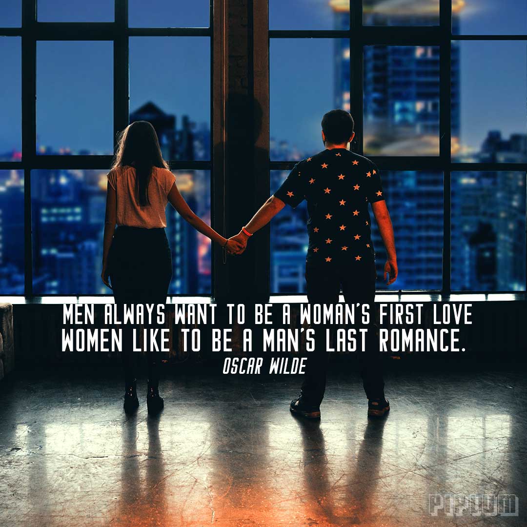Men always want to be a woman’s first love – women like to be a man’s last romance. Love quote by Oscar Wilde. Love-quote-Couple-lookin-to-the-the-night-lights-of-New-York-City-skyscraper