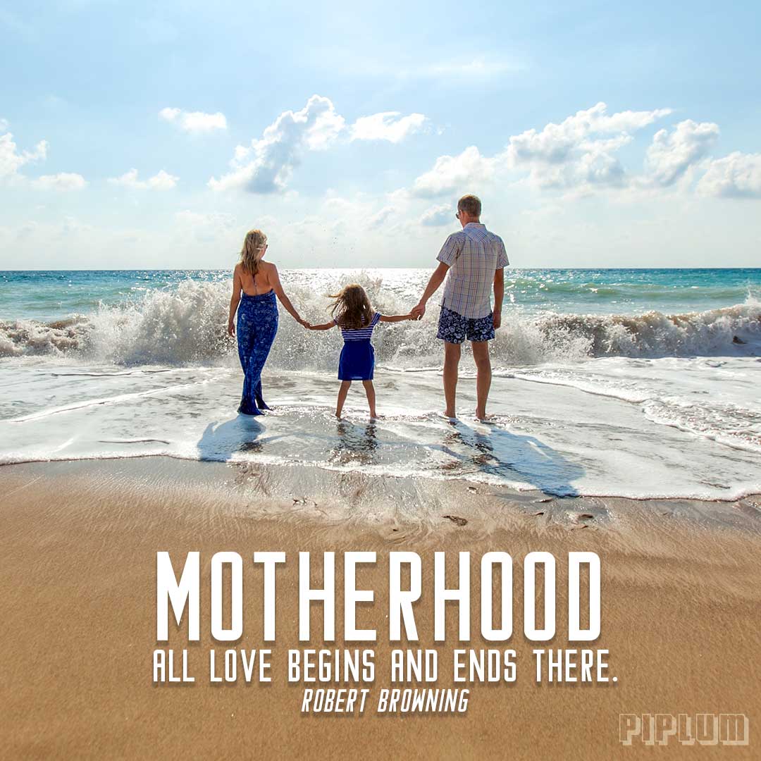 motherhood-quote-Family-holding-their-hands-in-the-beach.