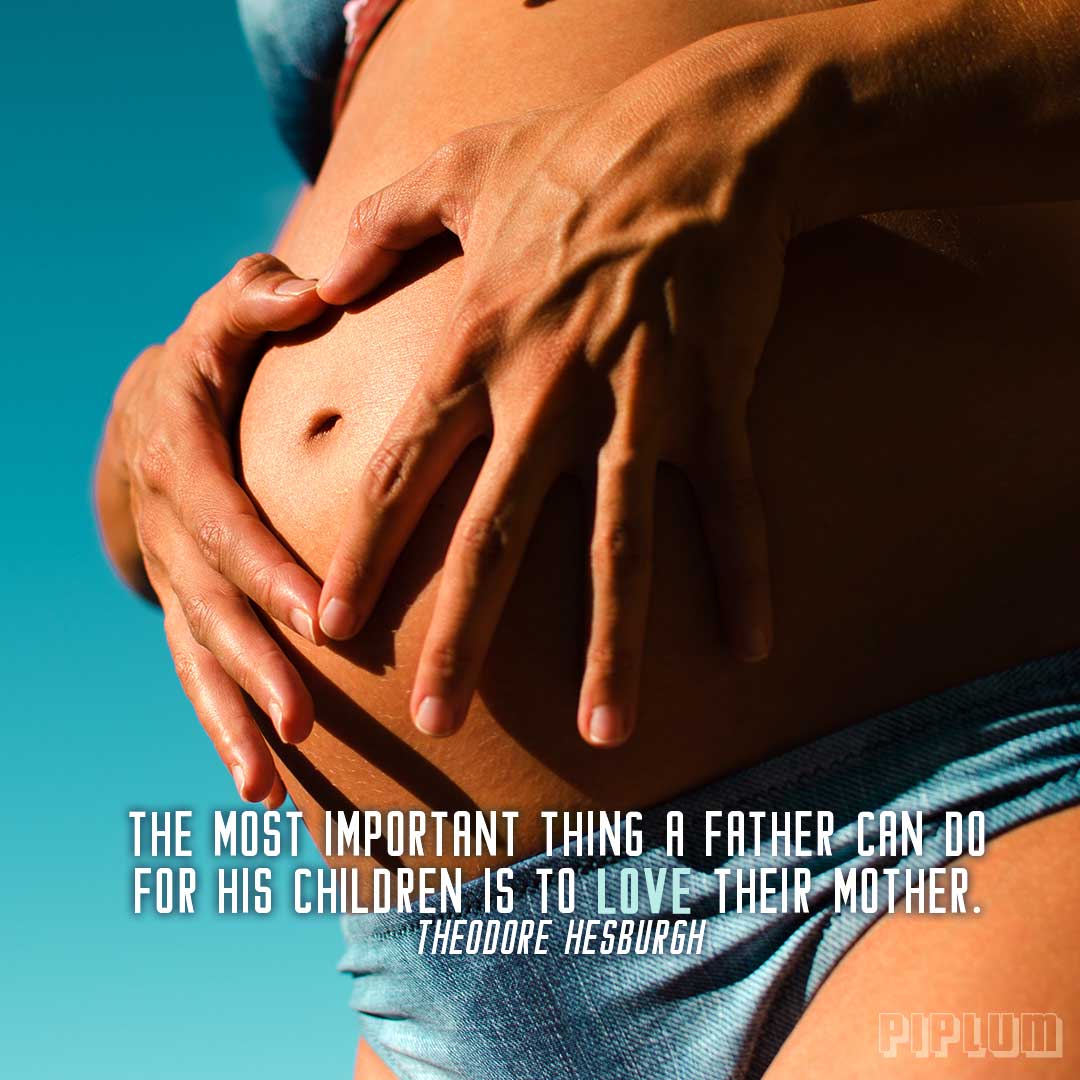 Love-quotes-Man-holding-his-hands-on-his-pregnant-wife-belly-baby-father-mother-mom