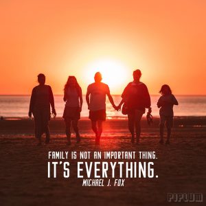 inspirational-Family quote. family walking back from the beach. Beautiful sunset behind them.