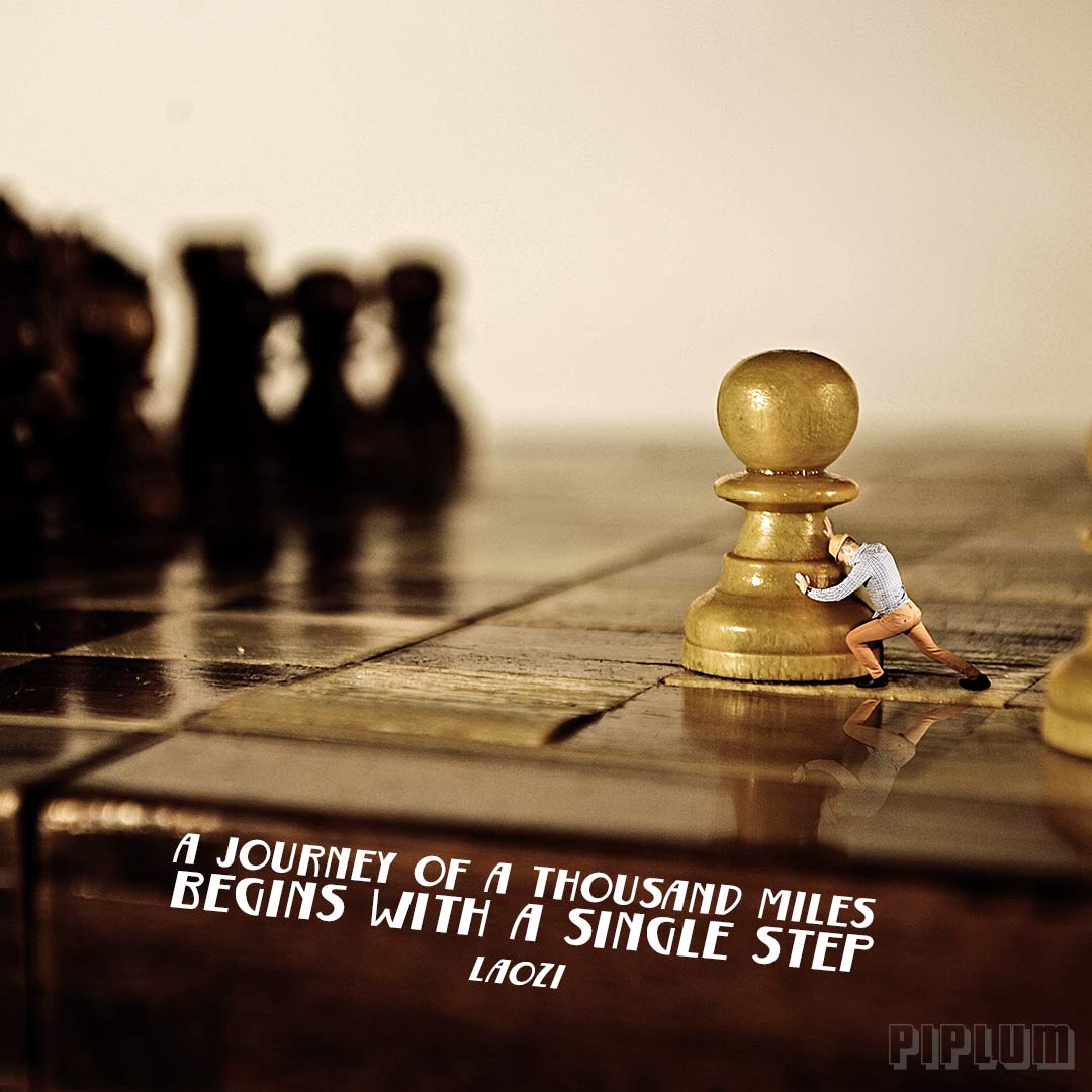 Inspirational-quote-Miniature-man-pushing-chess-figure-towards-is-goal-Surreal-photography.-Photo-manipulation