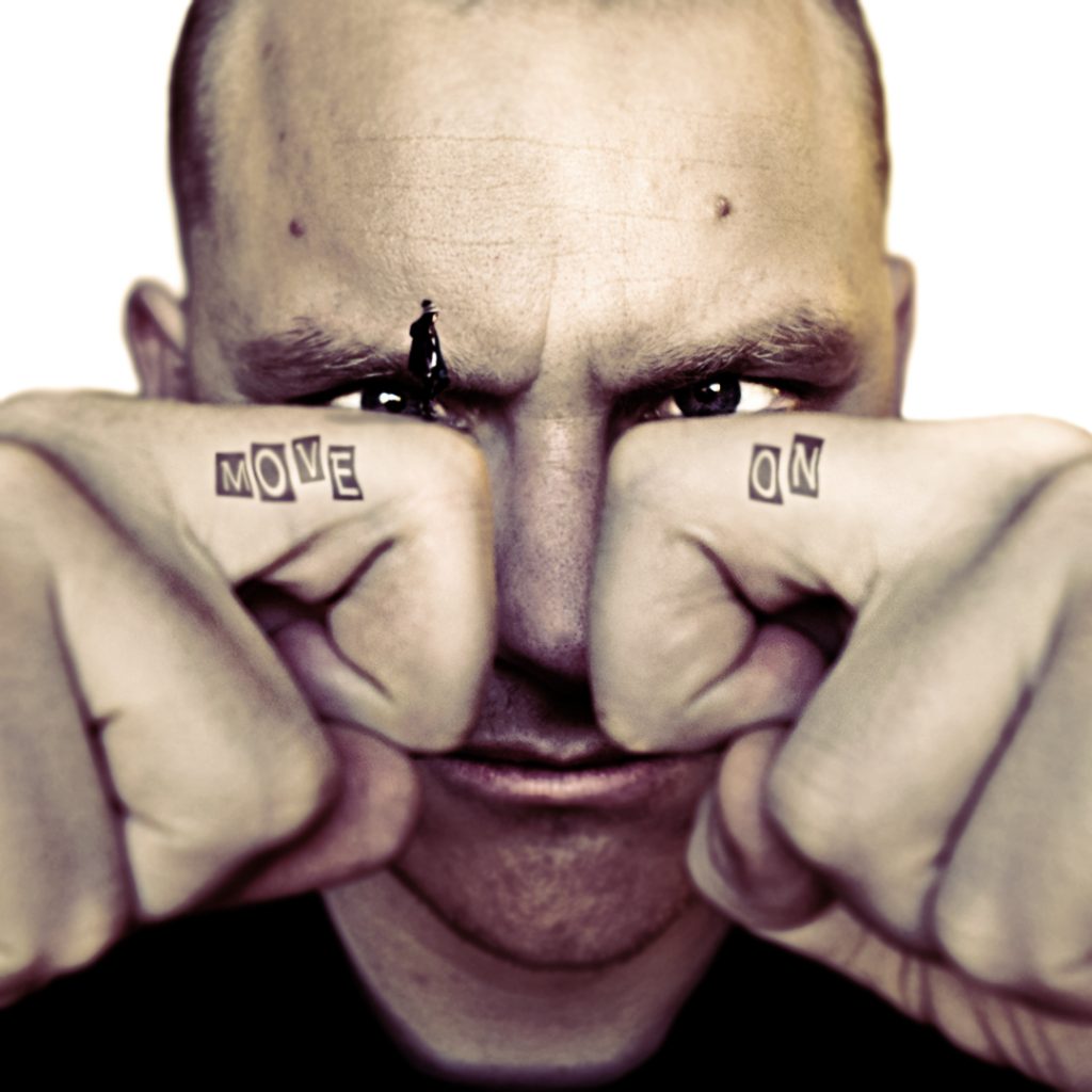 Move on. Quote. Man-face-with-bended-fingers-in-front-Text-tatoos-on-each-surreal-photography