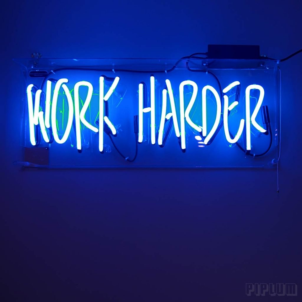 Work Quote. Work harder. Work-quote-Halogenated-light-on-the-wall.