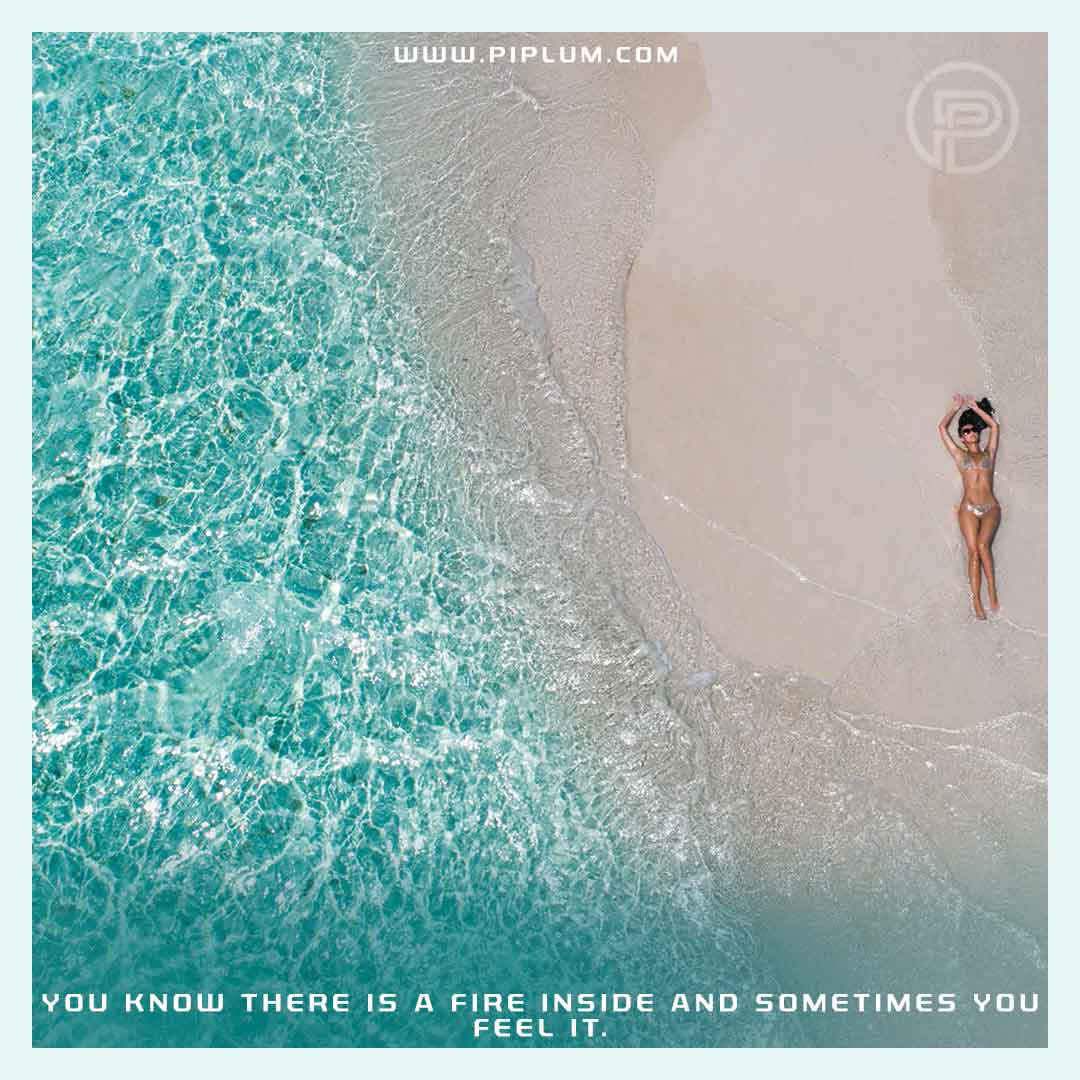 Motivational-quote-girl-relaxed-in-the-beach-close-to-the-water