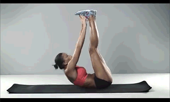abs-workout for women Vertical reversals, feet up vertically and hands with fingers to toe.