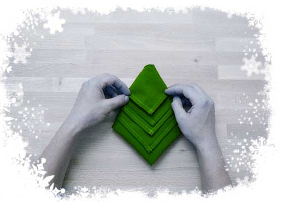Christmas-tree-folding-tutorial-Fold-the-upper-layer-to-the-top-to-form-a-peak-Step-5.