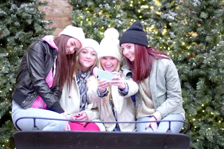 Girls-taking-group-selfie-for-christmas