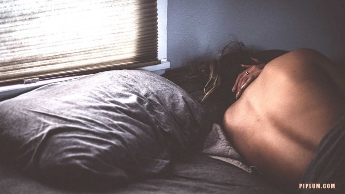 Night-sweats.-Girl-in-the-bead-sweating. Night-sweats.-Girl-in-the-bead-sweating.